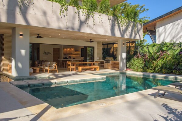 Large, private saltwater pool with deep and shallow ends