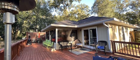 Huge deck with lots of space to enjoy sun, shade, play a game or a cool drink