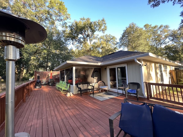 Huge deck with lots of space to enjoy sun, shade, play a game or a cool drink