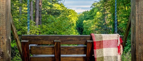 lose yourself in quiet meditation from this swing at Diamond Point on the property