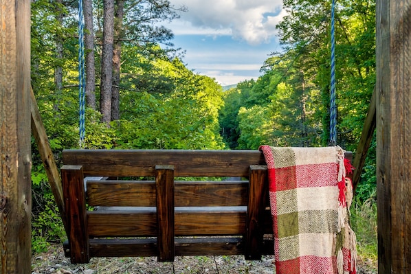 lose yourself in quiet meditation from this swing at Diamond Point on the property