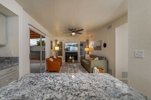 Kitchen flows into additional living room space