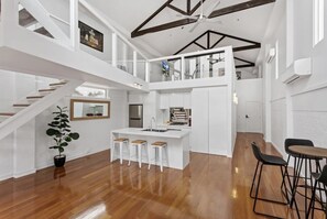 Kitchen and loft above