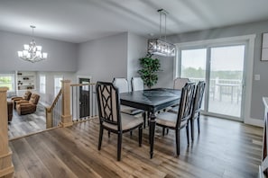 Dining space with large patio doors to the deck