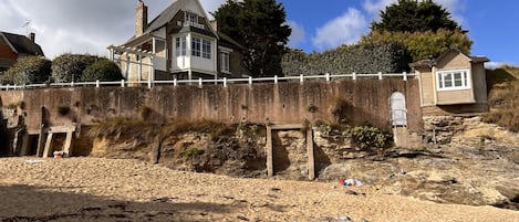 View onto the house from the beach. Direct access to the beach with private door