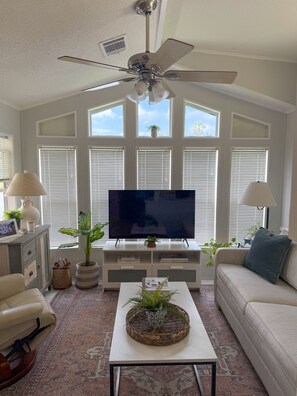 Smart TV and views to the pond with fountain