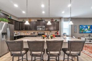 Kitchen with 4 counter stools