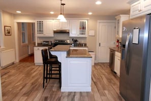 Large kitchen with breakfast bar
