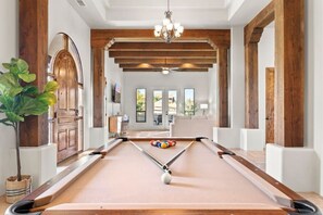 Billiards table in the front of the house