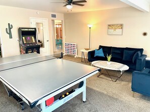 This is the Game Room with Prince ping pong table, arcade game, and Connect 4 game