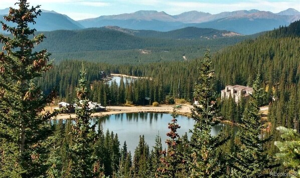 View of the Condo during the Summer.  Kayak and Fish in the lake using the included Boating and Fishing badges - Fishing gear provided!