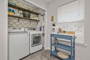 Laundry station with soap pods