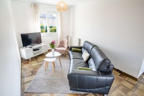 Partie salon et détente avec TV HD