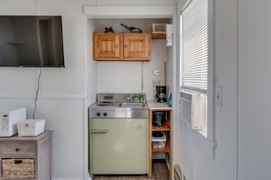 Kitchenette with pots and pans