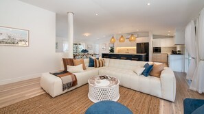 Main living room with fireplace, living and stunning kitchen 