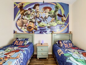 Toys story room with 2 single bed
