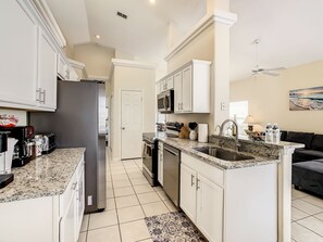 Fully equipped kitchen with a stainless steel appliances 