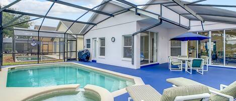 Our fantastic pool with 2 lounge chairs, dining table with umbrella