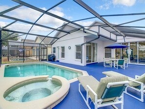 Our fantastic pool with 2 lounge chairs, dining table with umbrella