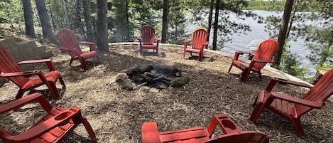 Large lakefront fire pit with plenty of space to relax, view the lake, and look up at the stars