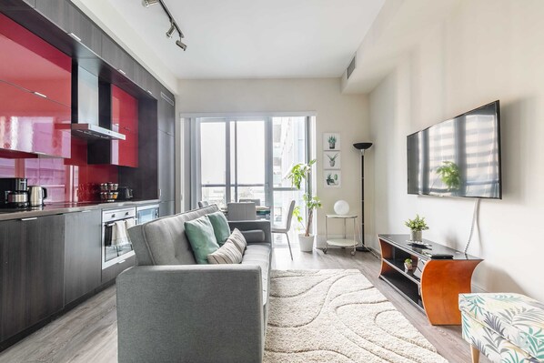 Radiant Living Room with Smart TV and Lots of Natural Light