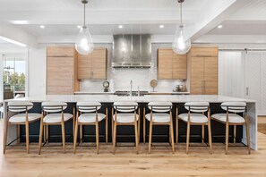 Full gourmet kitchen is well-stocked for meal prep