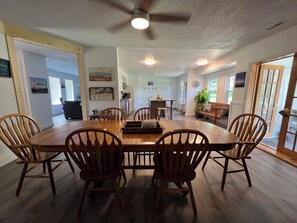 Huge open dining room/kitchen great for sharing meals & gathering. Table seats 8