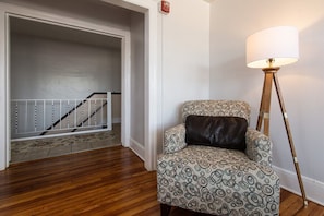 Just up the stairs are polished floors opening into the living room and kitchen.