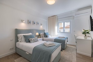 The apartment boasts two bedrooms, a double and twin, and a comfortable sofa-bed, perfect for family vacations #family #vacations #portugal #pt #cascais
