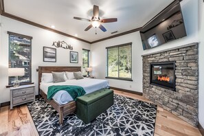 Master Suite one is located on the main floor with  a cal king size bed, gas fireplace and ensuite bathroom.