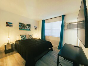 Neat, modern, cozy bedroom with closet and TV!