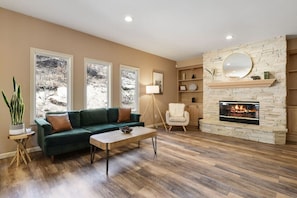 Family Room open to Kitchen with Fireplace