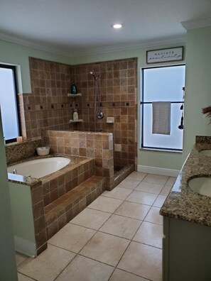 Full bathroom with tub