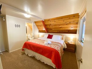 Bedroom boasts king bed and ensuite bath