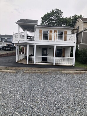 This is the front of the house. Park right beside the railing in DRIVEWAY 