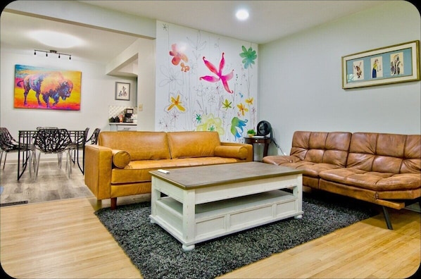 * Bright and cheerful living space with ample seating
* Center table top lifts up to become a working surface
* Room darkening as well has light filtering curtains
* At night, the open space can be used for air mattresses