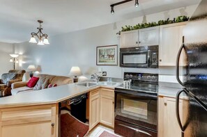 Kitchen with black appliances