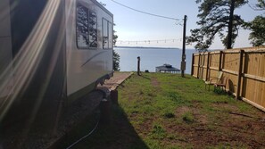 The other side of the Toledo Bend Camper sitting on its lakefront slot.