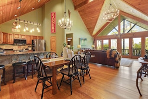 Wall of Windows, Vaulted Tongue-and-Groove Ceilings, and Open Great Room