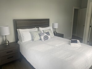 2nd Bedroom with TV and Tall Dresser