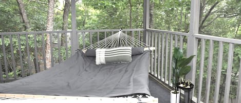 Relax on the hammock in the screened in deck.