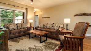 Quality and comfortable mountain-themed furniture highlight the living area.