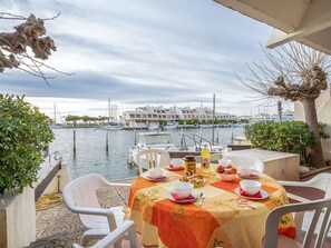 Water, Table, Furniture, Cloud, Plant, Sky, Tableware, Property, Chair, Outdoor Furniture