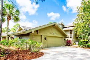 Driveway with parking for up to 4 vehicles & garage for parking!