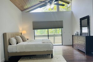 Grand Master Bedroom with a comfortable King Bed, private balcony & en suite bathroom