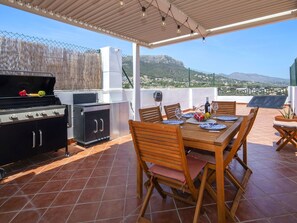 Furniture, Kitchen, Outdoor Furniture, Chair, Shade, Deck, Countertop, Kitchen & Dining Room Table, Major Appliance, Patio