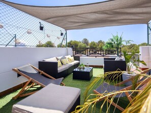 Furniture, Outdoor Furniture, Chair, Shade, Patio, Eco Hotel, Cushion, Balcony, Resort