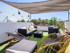 Furniture, Outdoor Furniture, Chair, Shade, Patio, Eco Hotel, Cushion, Balcony, Resort