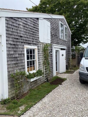 Shelled driveway entrance.