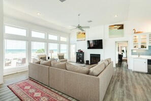 Bright and airy living area with vaulted ceilings